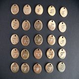 Buchstaben-Anhänger Messing