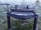 Preview: Großer Schwenkgrill auf grüner Wiese im Freien